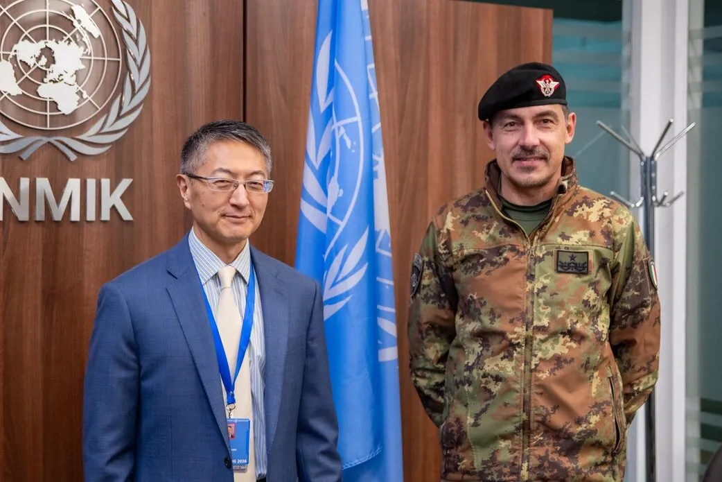UNMIK Deputy Special Representative of the Secretary-General and Officer in Charge Milbert Dongjoon Shin standing beside the incoming Deputy Commander of KFOR, Brigadier General Federico Collina, at UNMIK Headquarters. UNMIK Deputy Special Representative of the Secretary-General and Officer in Charge Milbert Dongjoon Shin standing beside the incoming Deputy Commander of KFOR, Brigadier General Federico Collina, at UNMIK Headquarters.