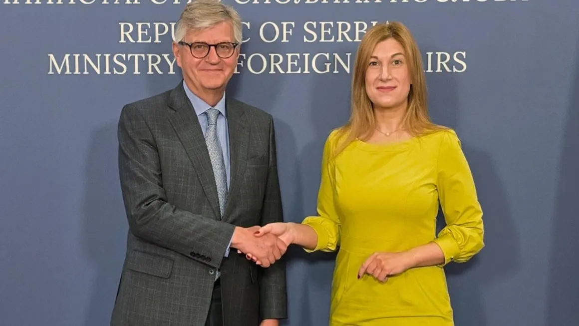 Man and woman shaking hands